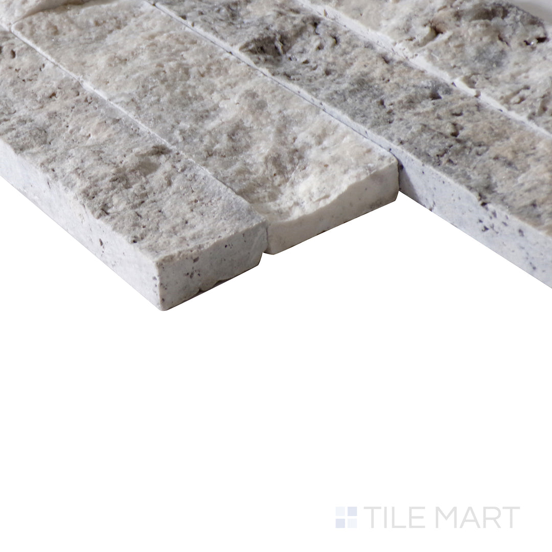 Corner shot of WHITE OAK MULTI SPLITFACE 6x24 PANEL  MARBLE PANEL with a SPLITFACE finish, showing the robust material and finely finished edge through a focused corner view.