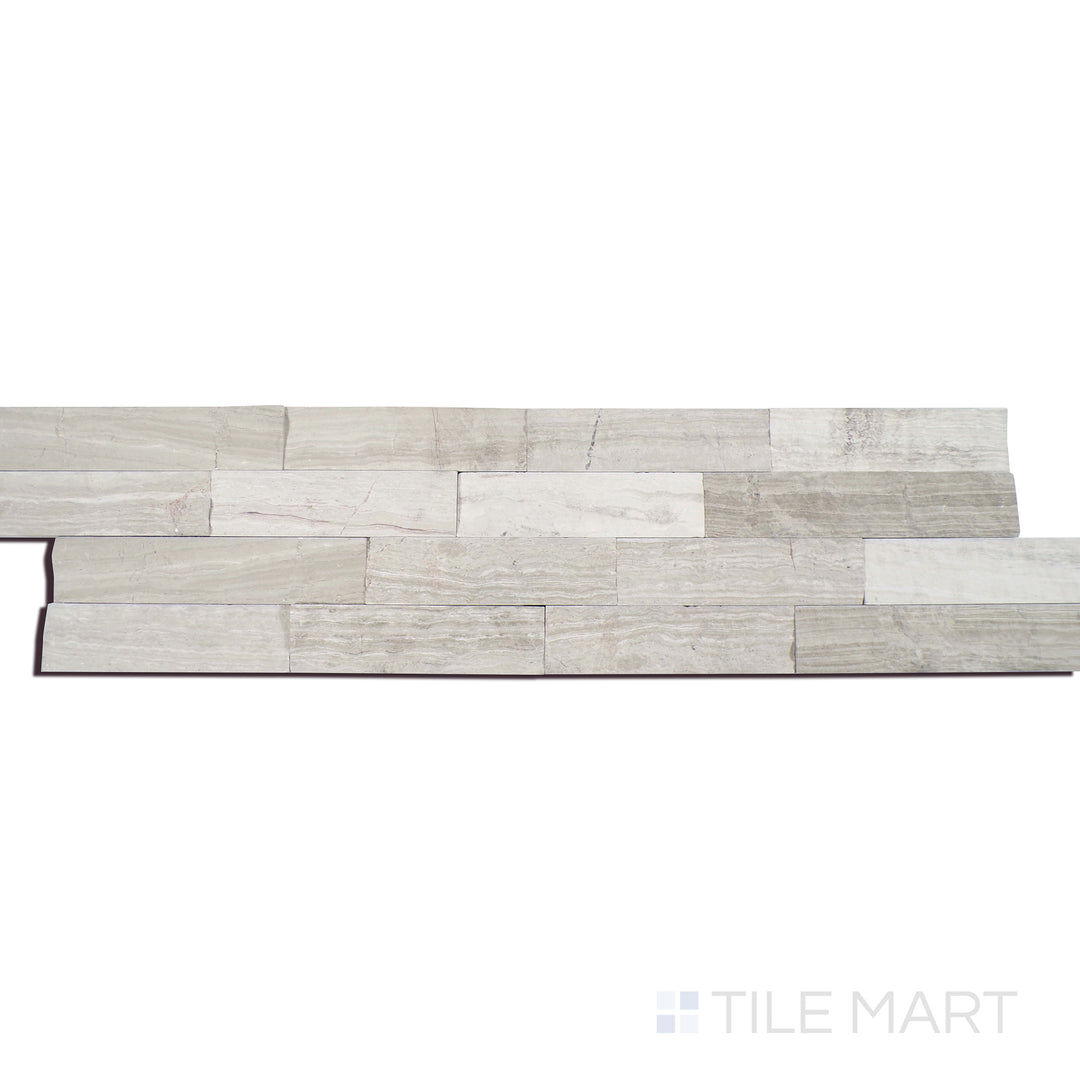 Angled shot of WHITE OAK SPLITFACE 6x24 PANEL  MARBLE PANEL with a SPLITFACE finish, offering a detailed look at the material's finish with a tilted viewpoint.