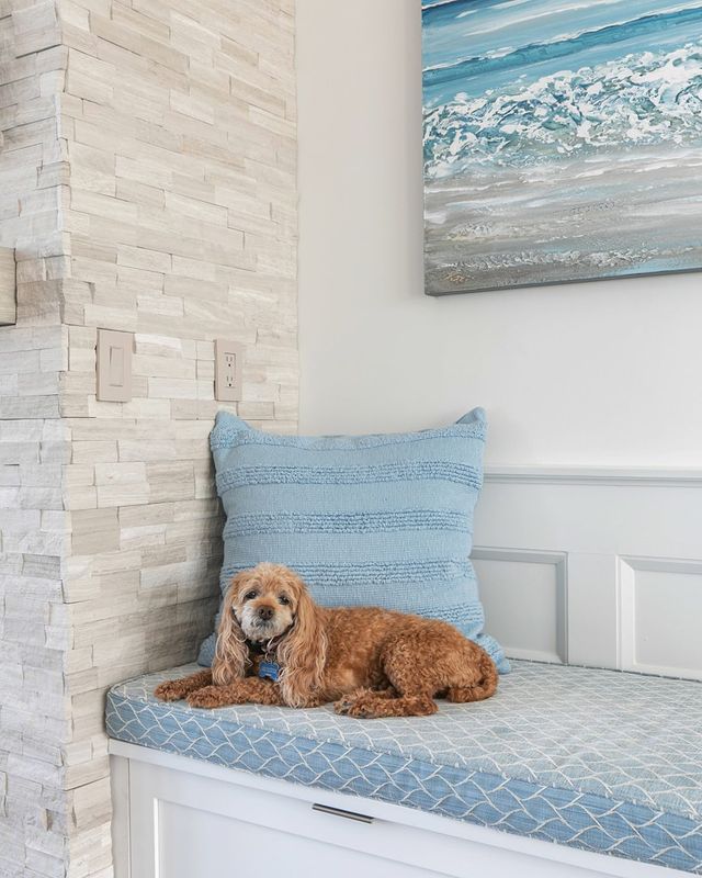 A subtle blend of white and cream hues with a textured surface provides a timeless and elegant appearance with Rockmount White Oak 6x24 stacked stone panel splitface marble.