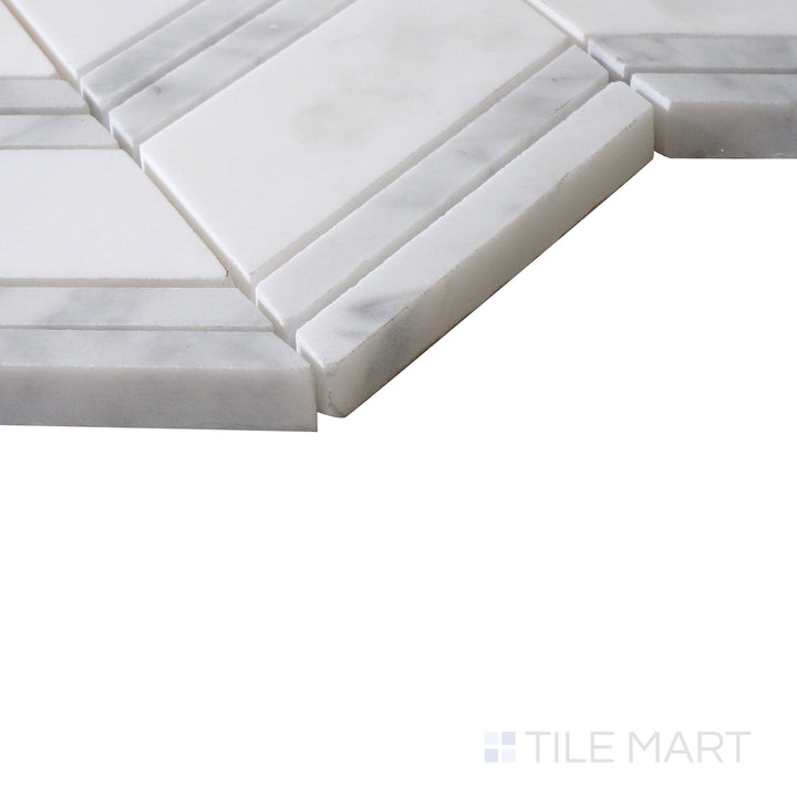 Corner shot of BIANCO DOLOMITE CHEVERON MOSAIC MARBLE MOSAIC with a POLISHED finish, showing the robust material and finely finished edge through a focused corner view.