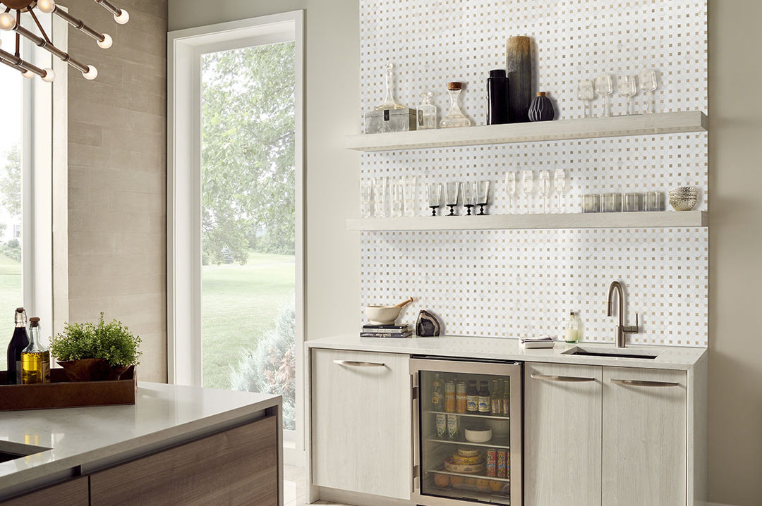 A polished marble mosaic with an intricate dotty pattern offers a refined and decorative touch, elegantly featuring Bianco Dolomite Dotty polished marble mosaic.