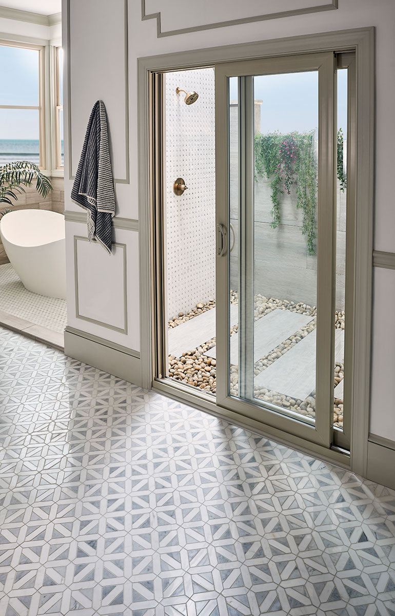 Smooth polished marble with a dotted pattern brings a touch of luxury and intricate design to any space with Bianco Dolomite Dotty polished marble mosaic.