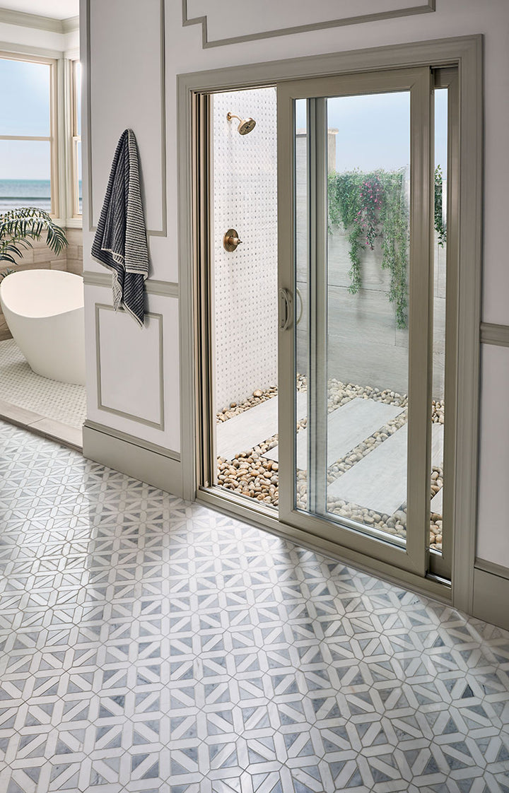 Smooth polished marble with a dotted pattern brings a touch of luxury and intricate design to any space with Bianco Dolomite Dotty polished marble mosaic.