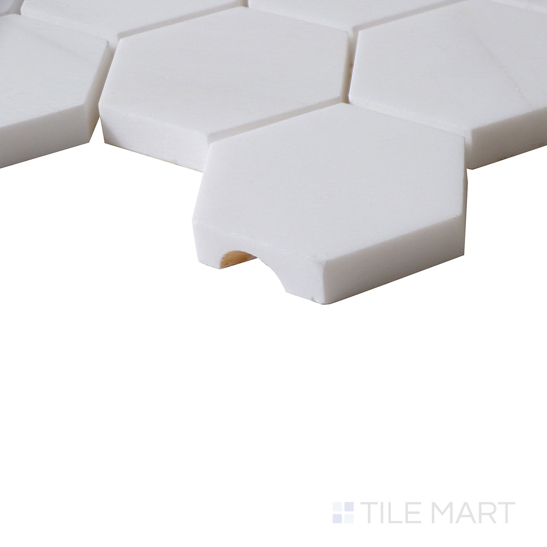 Corner shot of BIANCO DOLOMITE HEXAGON MOSAIC MARBLE MOSAIC with a POLISHED finish, revealing the intricate edge detailing and thickness from a corner viewpoint.