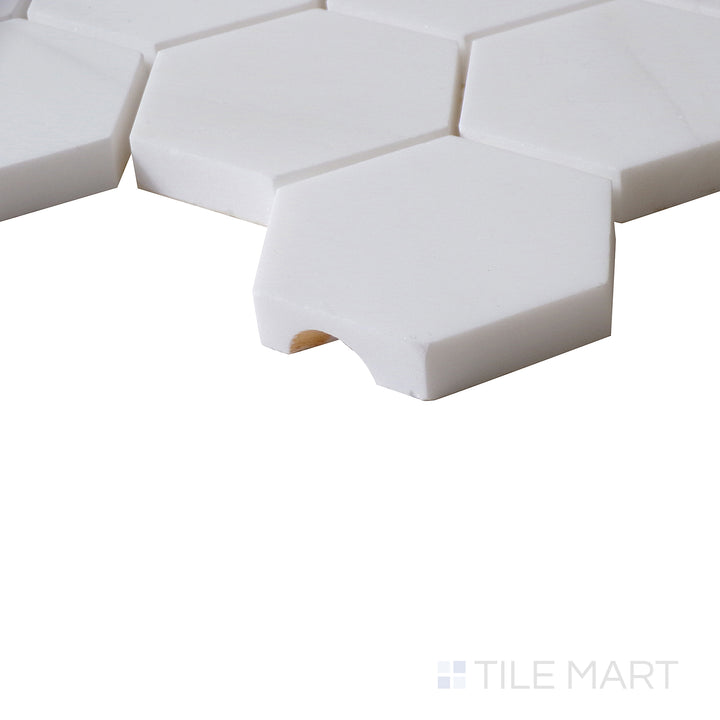 Corner shot of BIANCO DOLOMITE HEXAGON MOSAIC MARBLE MOSAIC with a POLISHED finish, revealing the intricate edge detailing and thickness from a corner viewpoint.