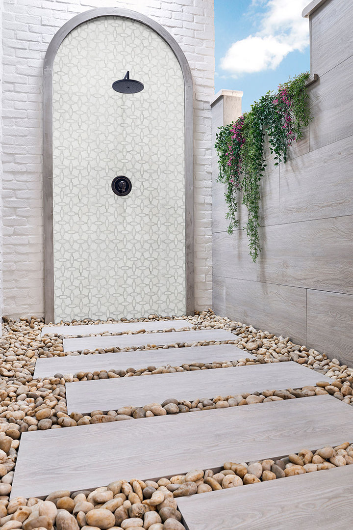 A structured gridwork design in polished marble brings a sleek and modern aesthetic, effortlessly complementing various styles with Bianco Dolomite Gridwork polished marble mosaic.