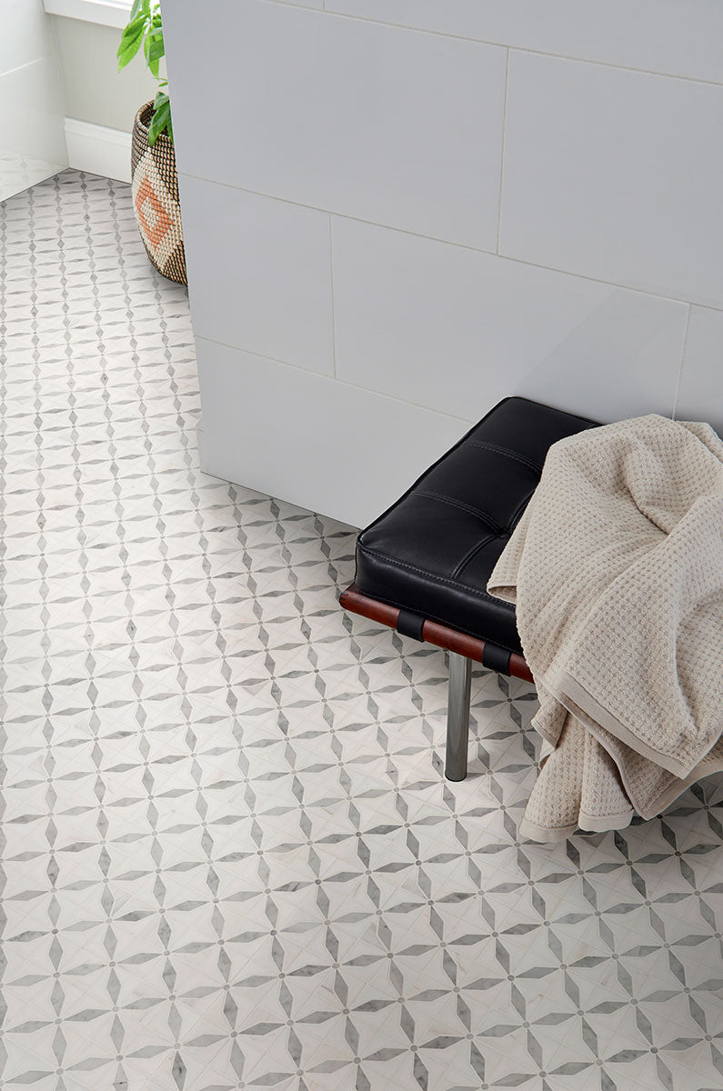 A polished marble mosaic with subtle star-like details, Bianco Dolomite Starlite delivers a refined yet unique visual appeal.