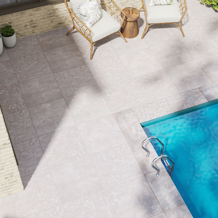 The eased edge of Benton Grey 13x24 coping porcelain ensures a smooth transition, with a matte gray finish for a sleek look.