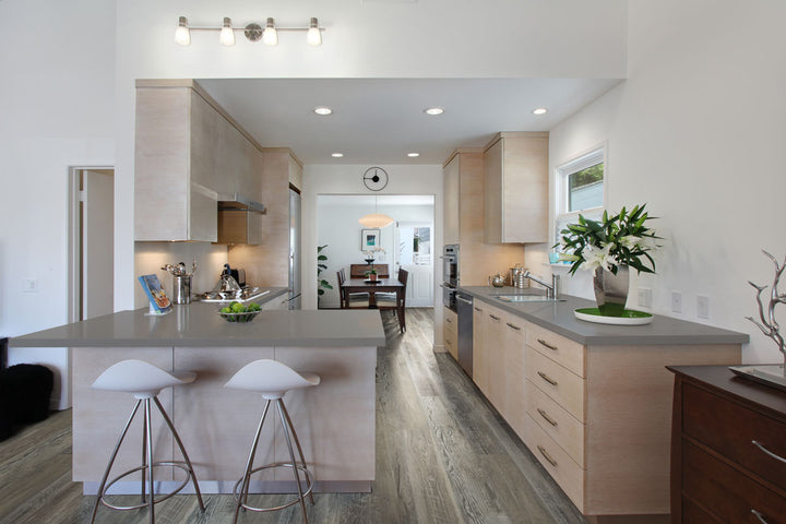 Modern home design with Ashton 2.0 Stableton 7X48 flooring bringing a clean, linear wood grain look.