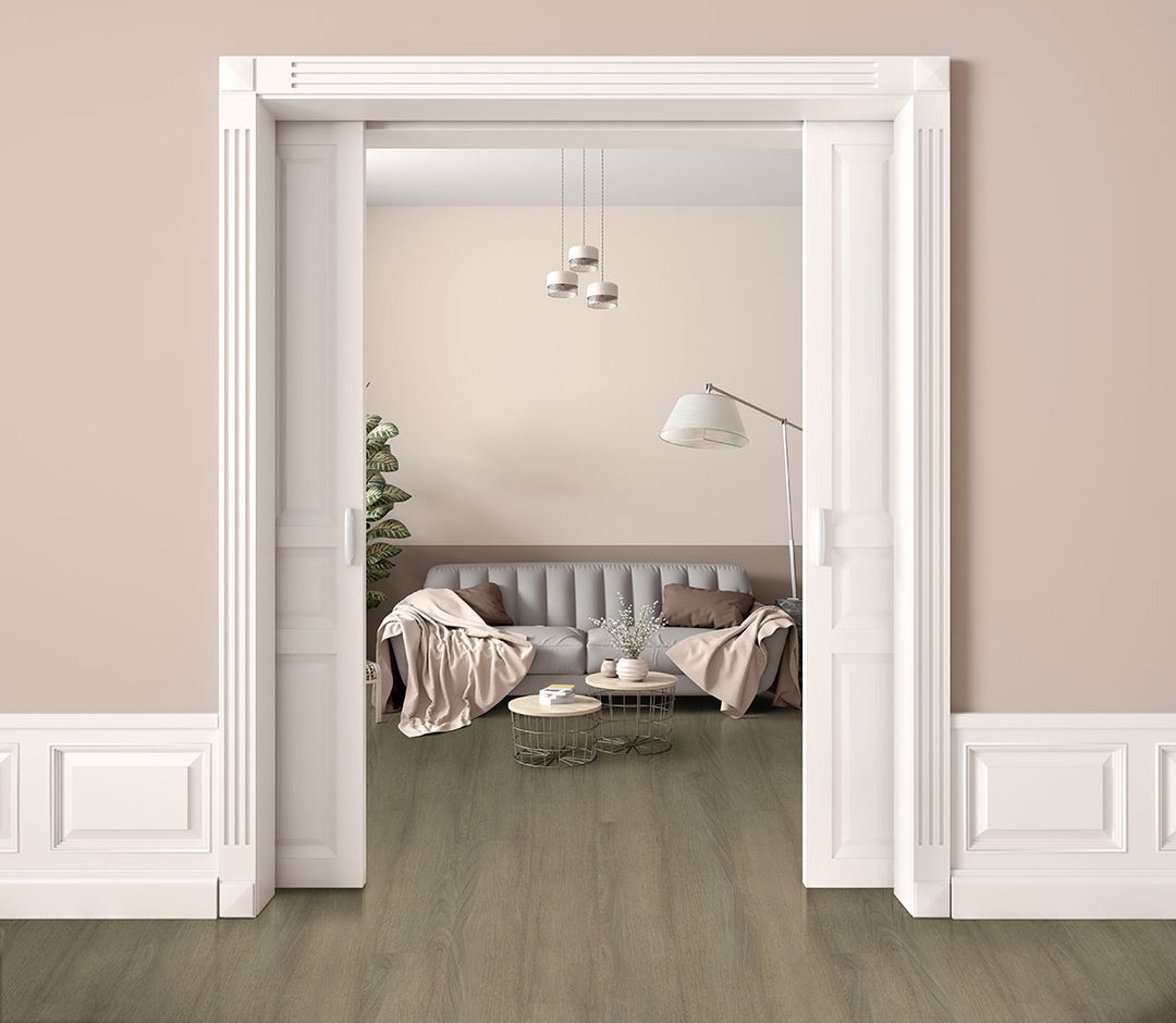 Ashton 2.0 Sunnyset 7x48 vinyl planks displayed in a golden finish with soft wood grain, providing a light and inviting appearance.