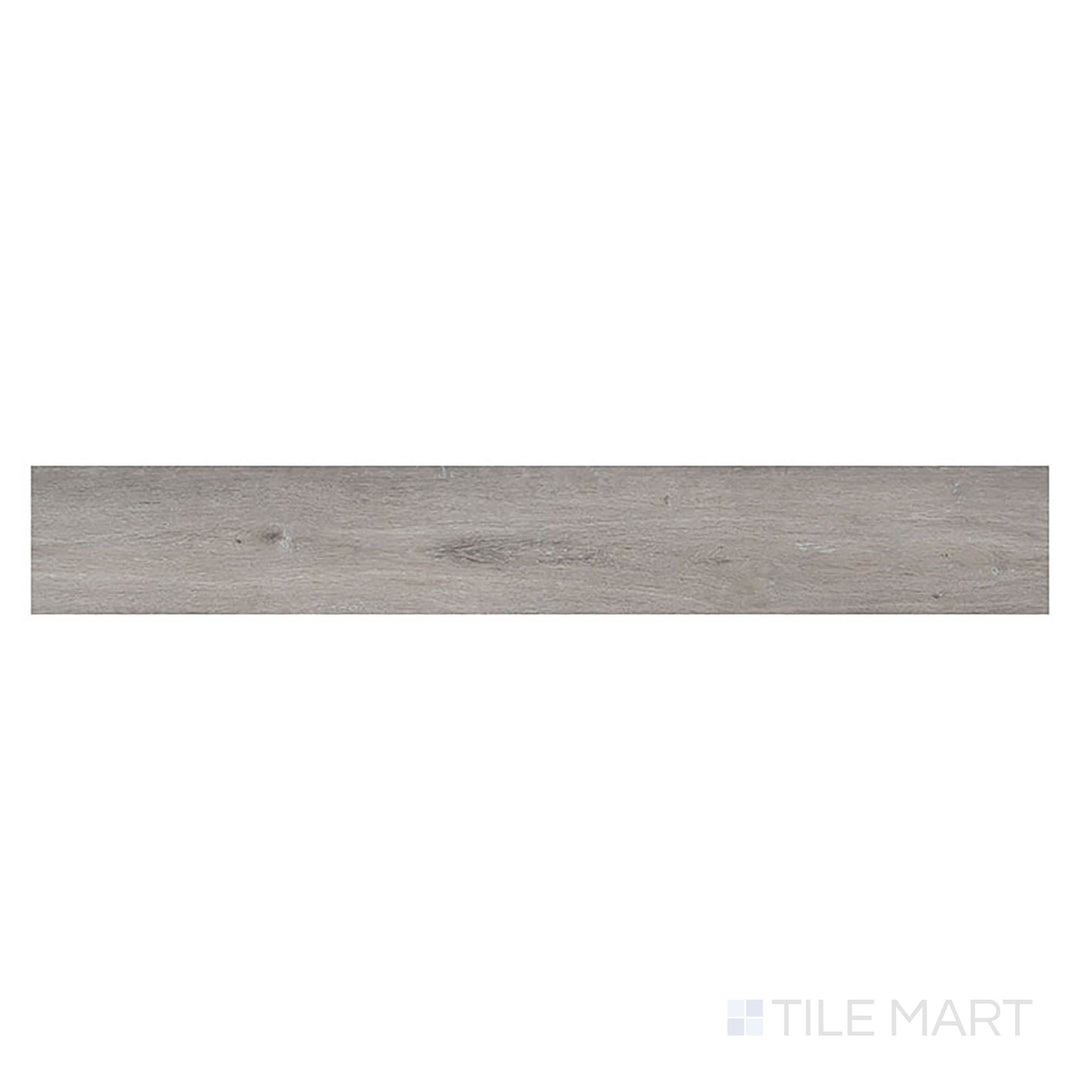 Presented from above, Cyrus 2.0 Finely 7x48 low gloss vinyl plank highlights gentle brown tones and smooth woodgrain detail.