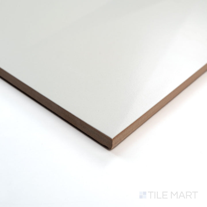 Corner angle shot of Nuvo Summit 12x36 Satin Ceramic Tile highlighting its smooth satin surface and elongated shape with subtle depth.
