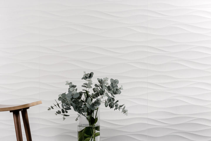 Nuvo Wave 12x36 Satin Ceramic Tile shown in a real-life application, featuring its wave-inspired pattern on a feature wall in a modern room design.
