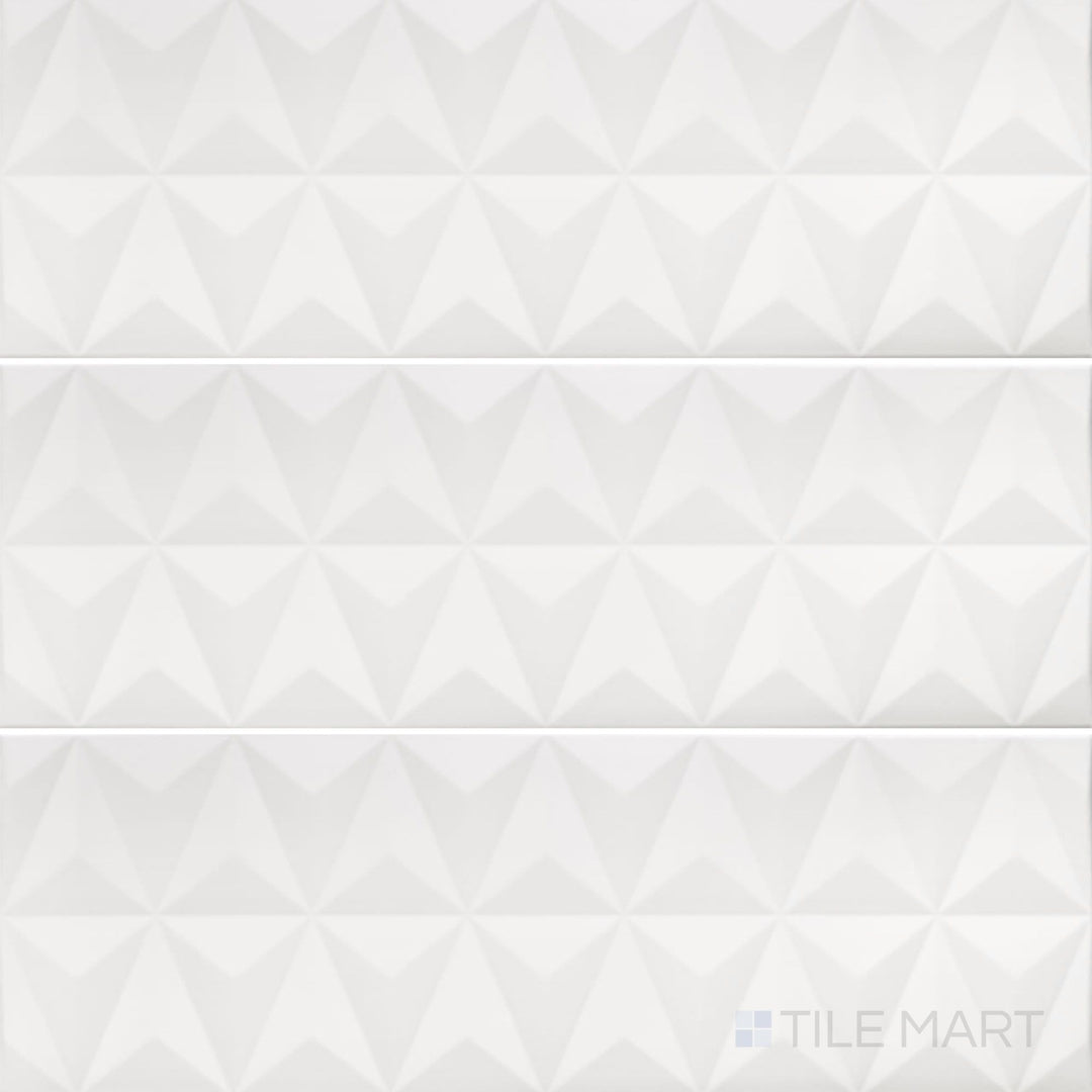 Overview shot of Nuvo Pliage 12x36 Satin Ceramic Tile showcasing its elegant fold-inspired texture and satin finish in a modern rectangular layout.