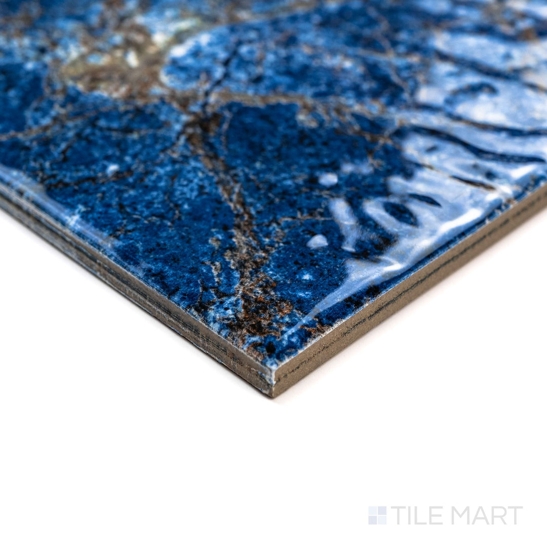 Angled shot of Rini Solene 6x6 Glossy Glazed Porcelain Tile showing its glossy surface and vibrant tone from a corner perspective.