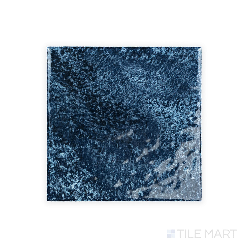 Rini Ocean 6x6 Glossy Glazed Porcelain Tile seen from above, capturing its deep oceanic color and smooth high-gloss glaze across the full surface.