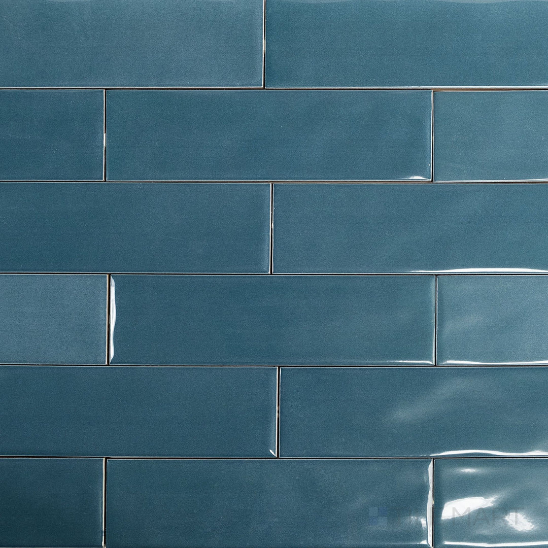 Overview image of Canvas Konjo Blue 3x10 Glossy Ceramic Tile with a vibrant blue glaze and sleek, elongated shape ideal for expressive wall layouts.
