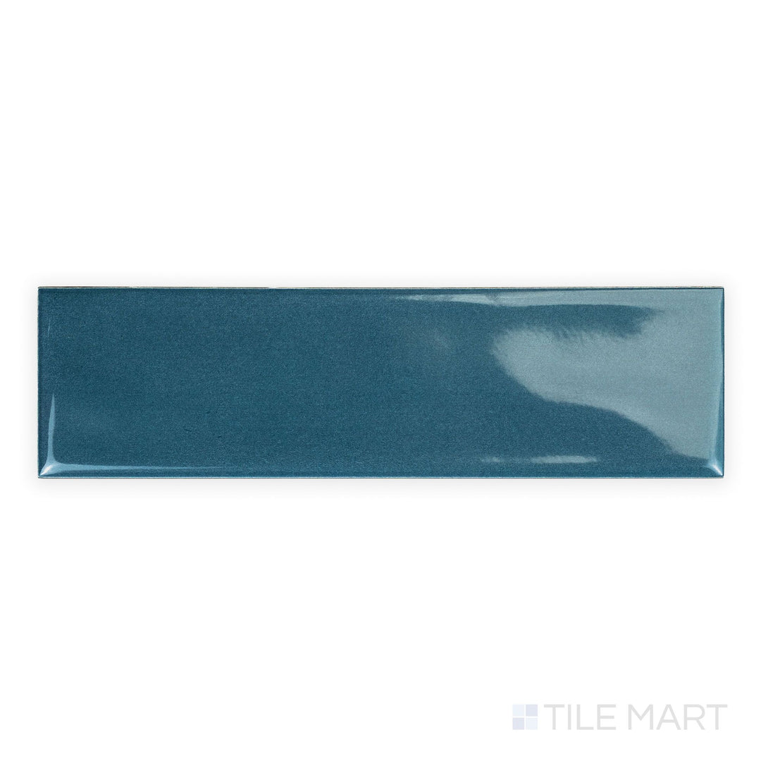 Canvas Konjo Blue 3x10 Glossy Ceramic Tile seen from above, featuring a vibrant blue gloss and clean linear shape for bold wall applications.