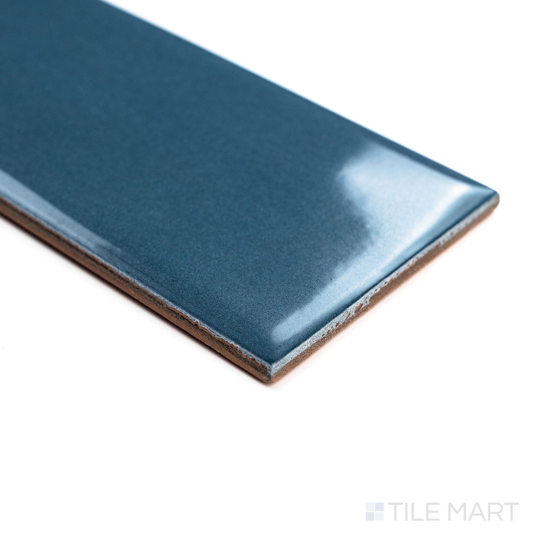 Corner perspective of Canvas Konjo Blue 3x10 Glossy Ceramic Tile highlighting its vibrant blue tone and glossy ceramic finish with visible depth.