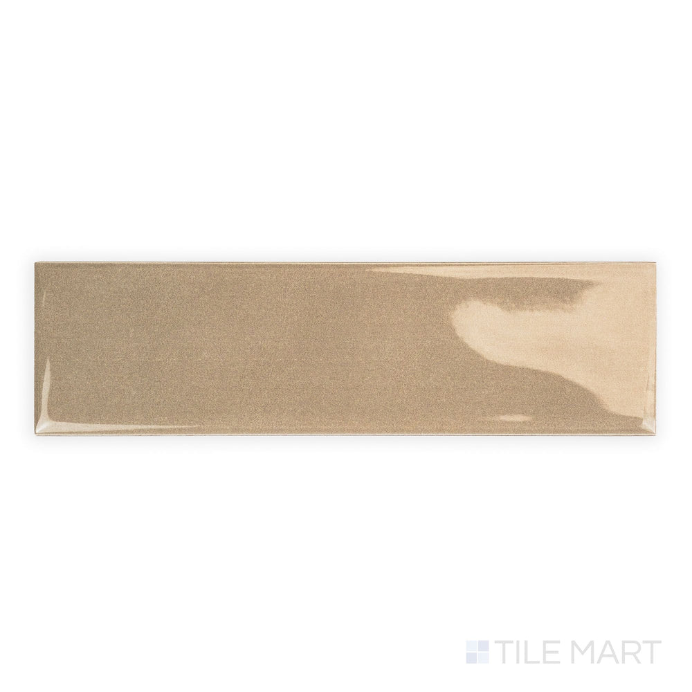 Canvas Desert Sand 3x10 Glossy Ceramic Tile in a top-down perspective, displaying its warm sandy tone and reflective surface in a plank-style format.