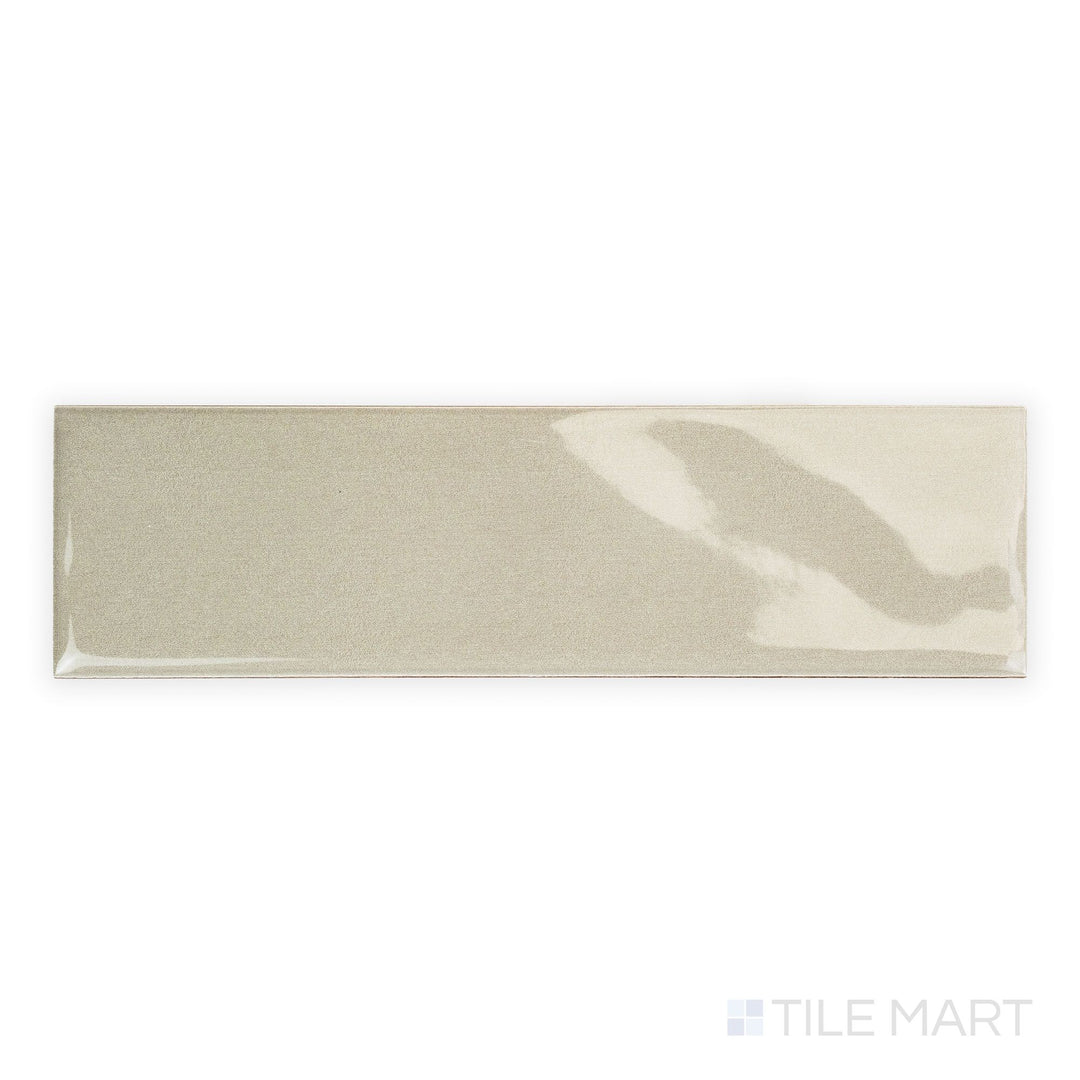 Top-down view of Canvas Moon Gray 3x10 Glossy Ceramic Tile with a neutral gray glaze and high-gloss finish in a long, rectangular form.