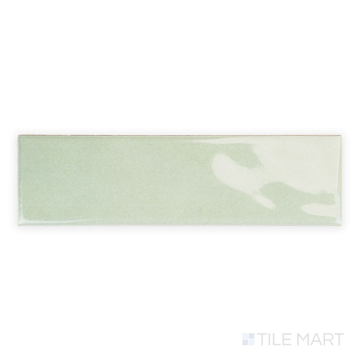 Top-down image of Canvas Quiet Sage 3x10 Glossy Ceramic Tile showing its muted green glaze and smooth glossy finish in a slim rectangular format.