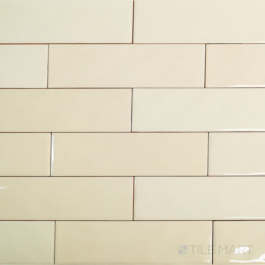 Overview shot of Canvas Sago Pearl 3x10 Glossy Ceramic Tile revealing its pearly off-white color and clean, glossy rectangular format.