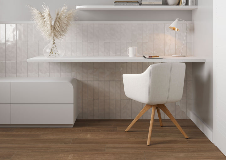 Canvas Yuki White 3x10 Glossy Ceramic Tile installed in a bright, clean-lined space, highlighting its crisp white finish and reflective ceramic texture.
