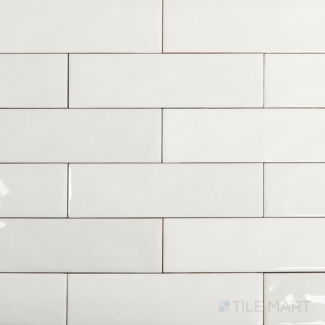 Canvas Yuki White 3x10 Glossy Ceramic Tile in an overview view, presenting its crisp white tone and shiny surface in a slender tile format.
