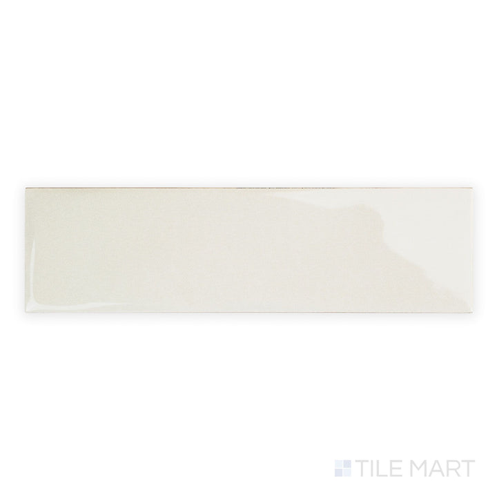 Canvas Yuki White 3x10 Glossy Ceramic Tile in a top-down perspective, showcasing its pure white glaze and reflective ceramic body in a narrow profile.