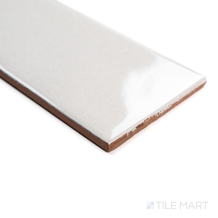 Corner angle of Canvas Yuki White 3x10 Glossy Ceramic Tile featuring a crisp white glaze and reflective ceramic texture with dimensional lighting.