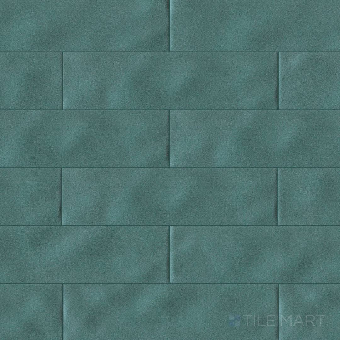 Canvas Midnight Jade 3x10 Glossy Ceramic Tile shown in a full overview shot, highlighting its deep green-blue glaze and reflective ceramic finish.