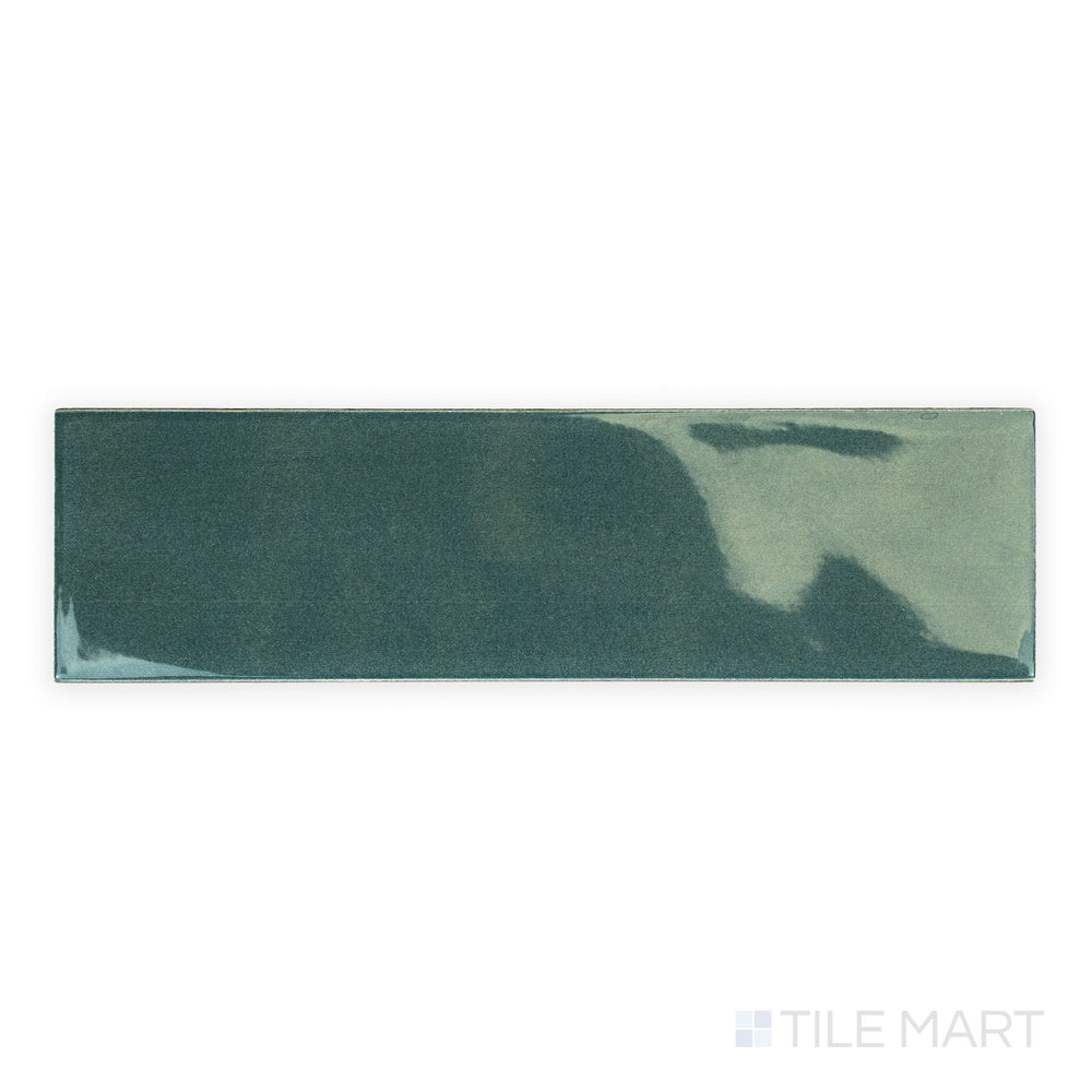 Canvas Midnight Jade 3x10 Glossy Ceramic Tile seen from above, displaying its rich deep green tone and glossy surface in a modern elongated layout.
