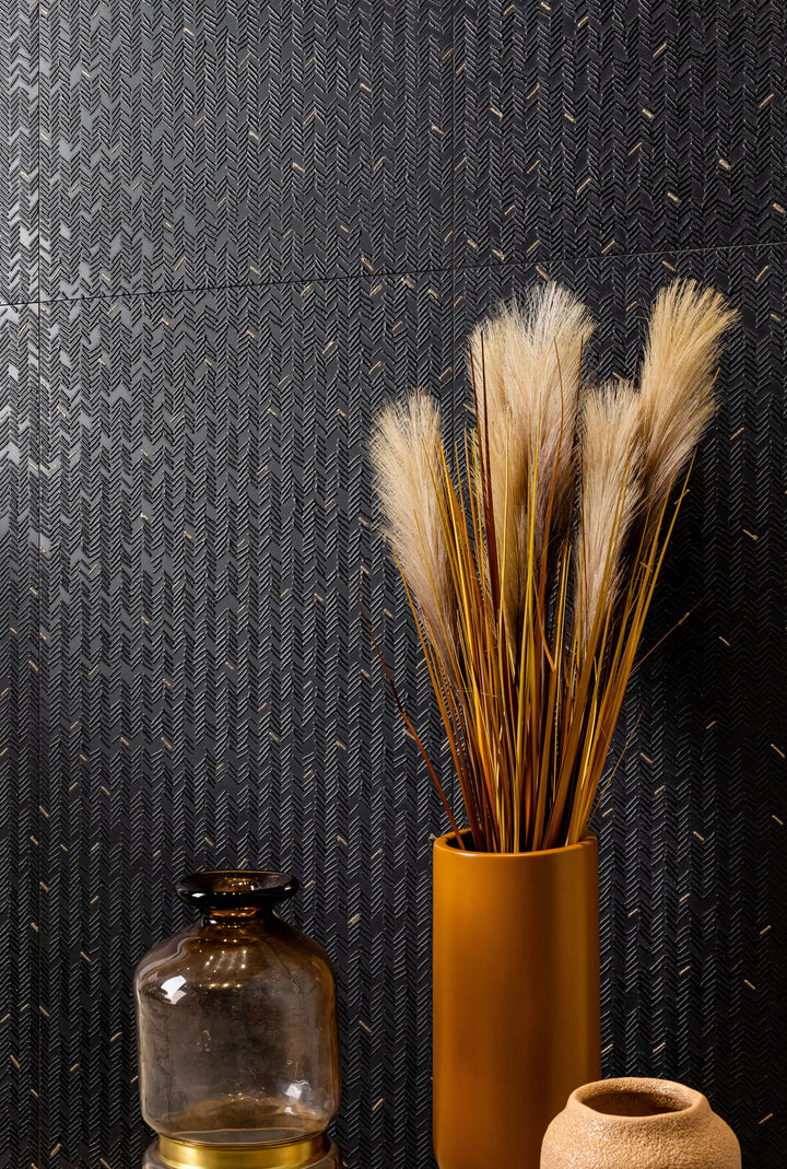 Bold and dramatic, the Aurora Noir 12x36 Metallic Ceramic Tile introduces striking contrast and modern metallic texture to the interior.