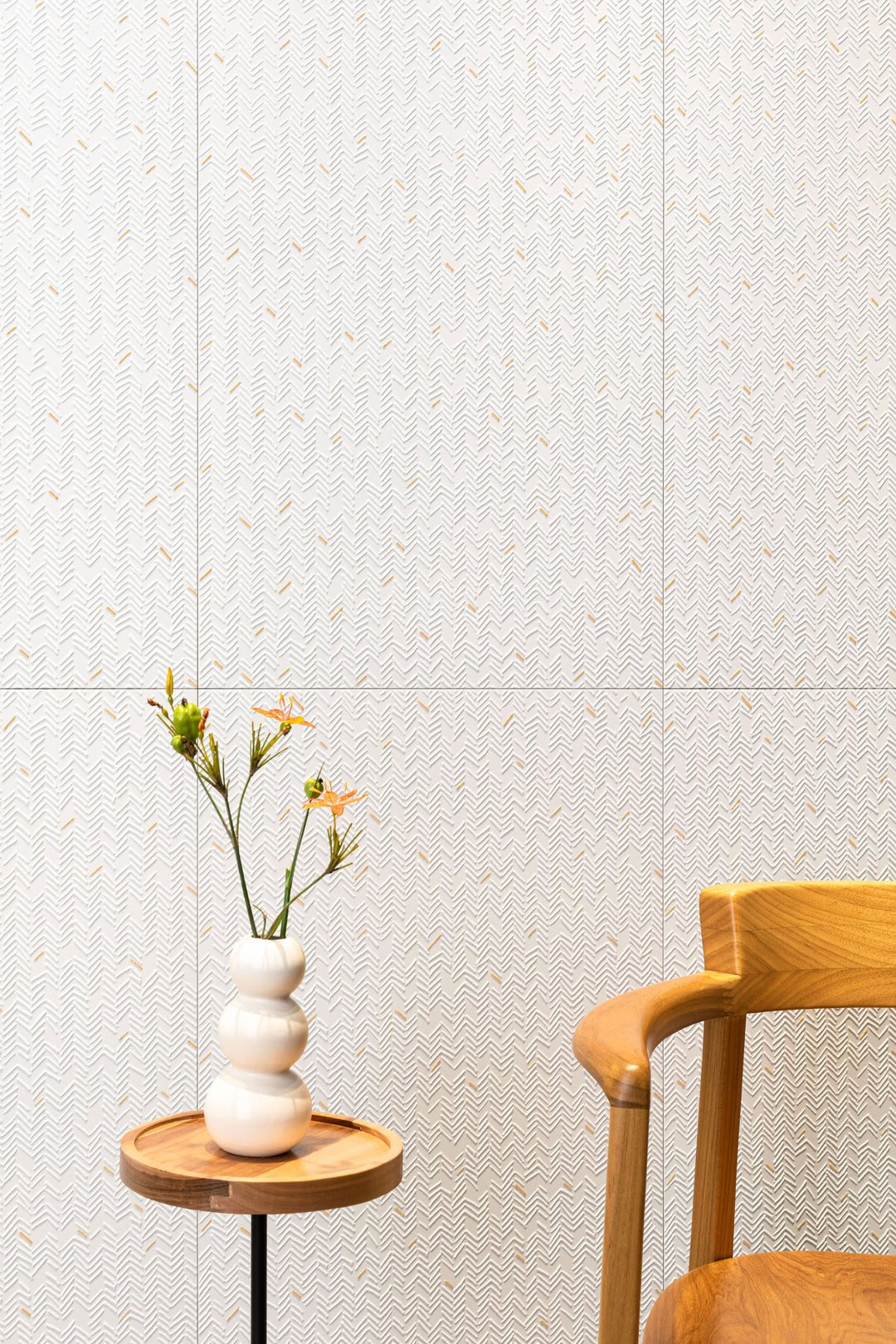 Reflecting light with a subtle shimmer, the Aurora Blanc 12x36 Metallic Ceramic Tile complements the space with a sleek, clean tone.