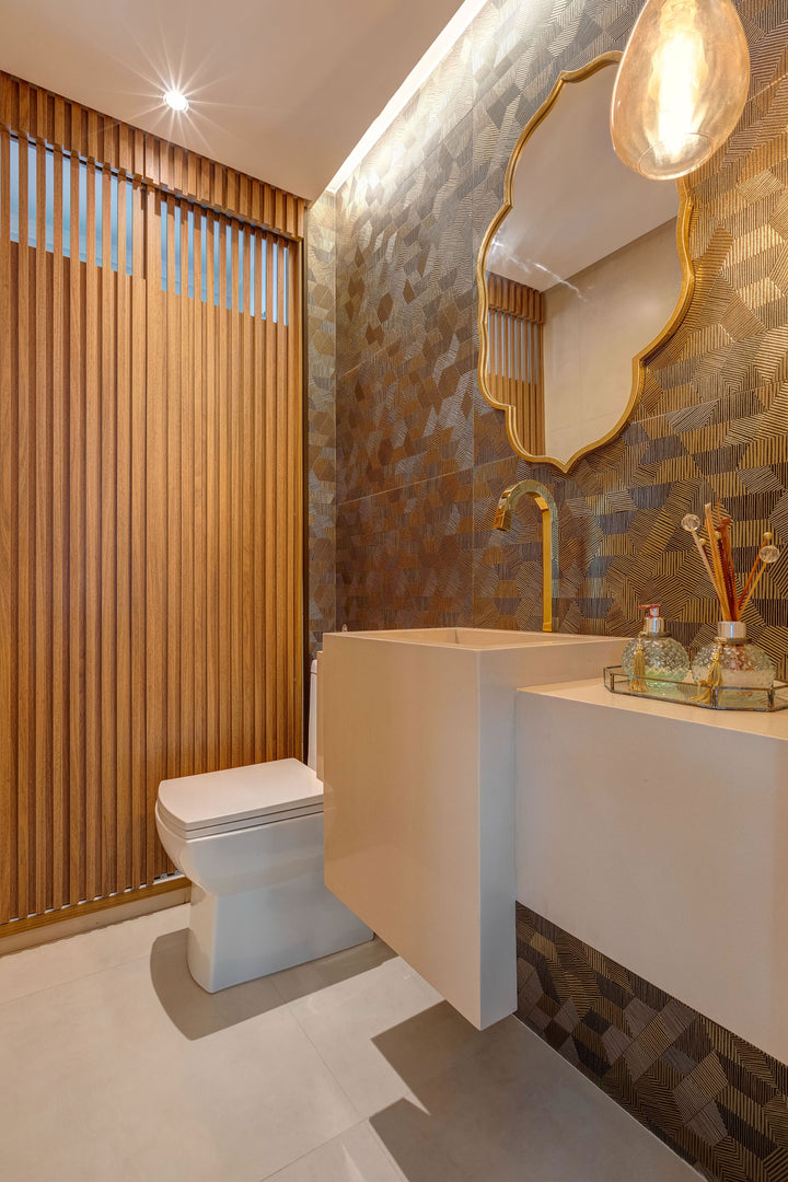 Aurora Gold 12x36 Metallic Ceramic Tile adding warmth and luxury to a real-world design, with its golden sheen catching light across the space.