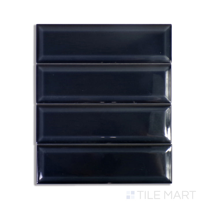 A bold indigo blue ceramic tile with a glossy finish, perfect for making a striking statement in modern interiors.