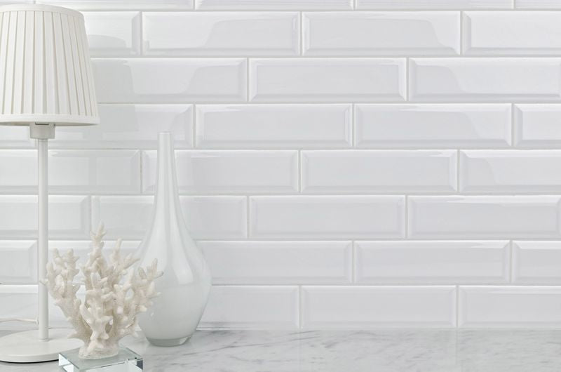 An elegant space with glossy white tiles from the Salt Glossy series, reflecting natural light beautifully.