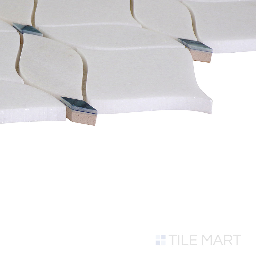 The indigo blue tile from the Boutique Sleek series, captured from an angle to emphasize its striking color and matte finish.