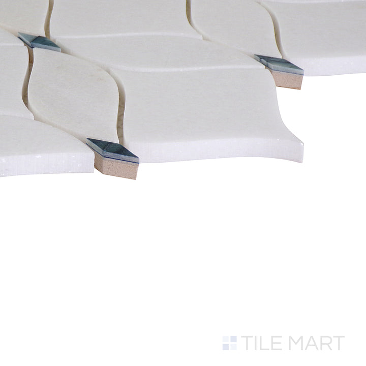 The indigo blue tile from the Boutique Sleek series, captured from an angle to emphasize its striking color and matte finish.