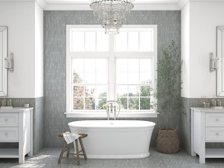 Soft, matte white tiles provide a peaceful and understated backdrop, enhancing the serene ambiance of the room.