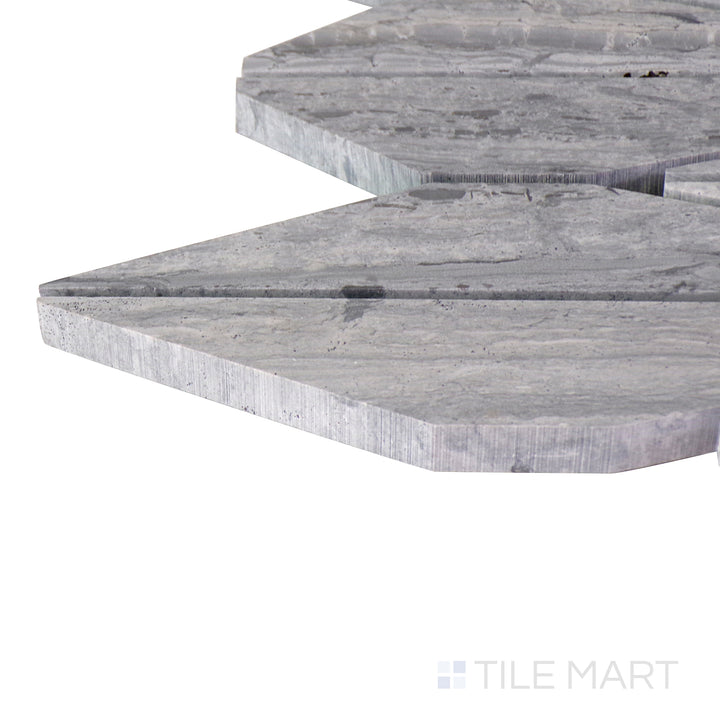 A close-up of the matte white tile's corner, showing its refined edges and robust material thickness.