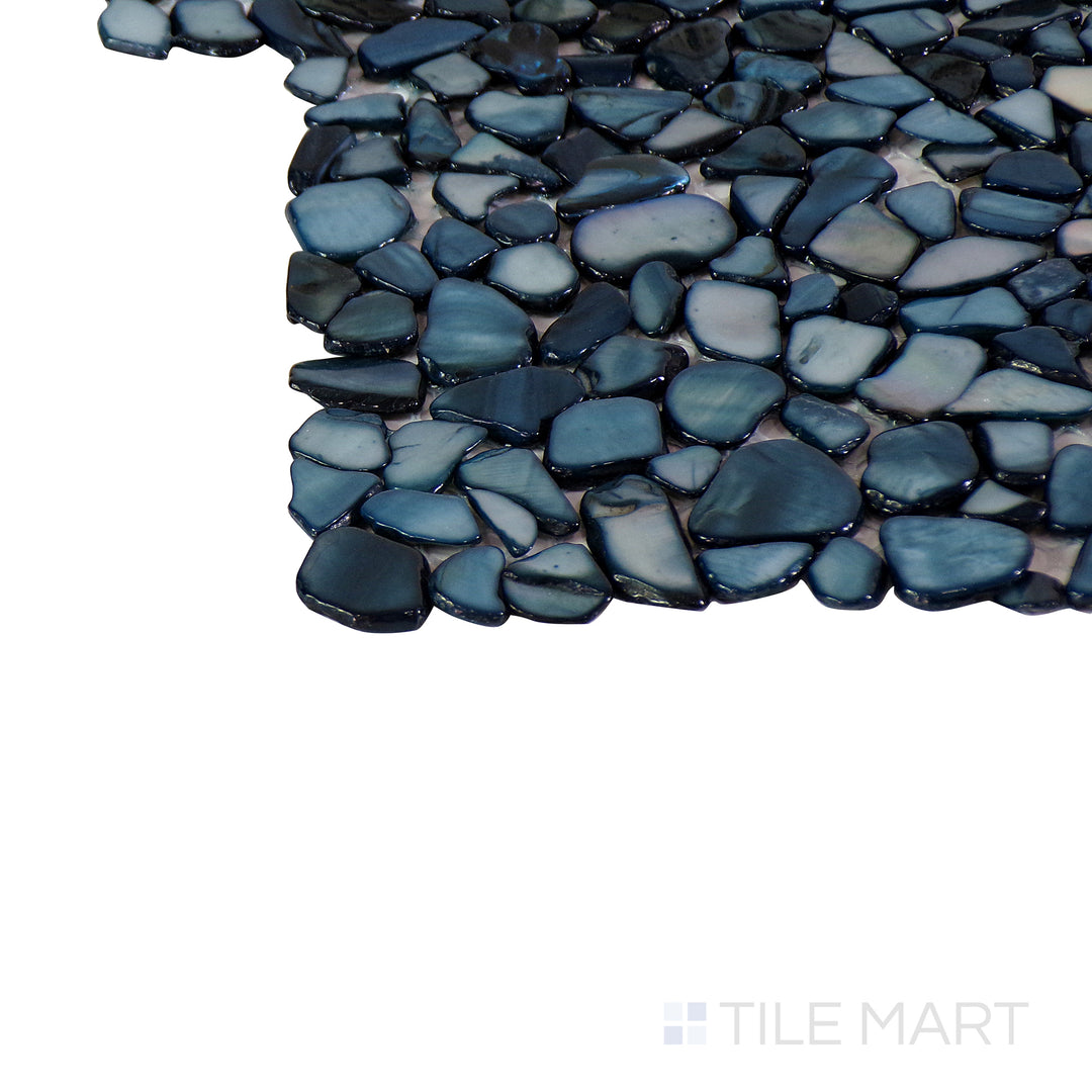 A detailed corner view of the indigo blue tile, showcasing its thickness and robust ceramic construction.