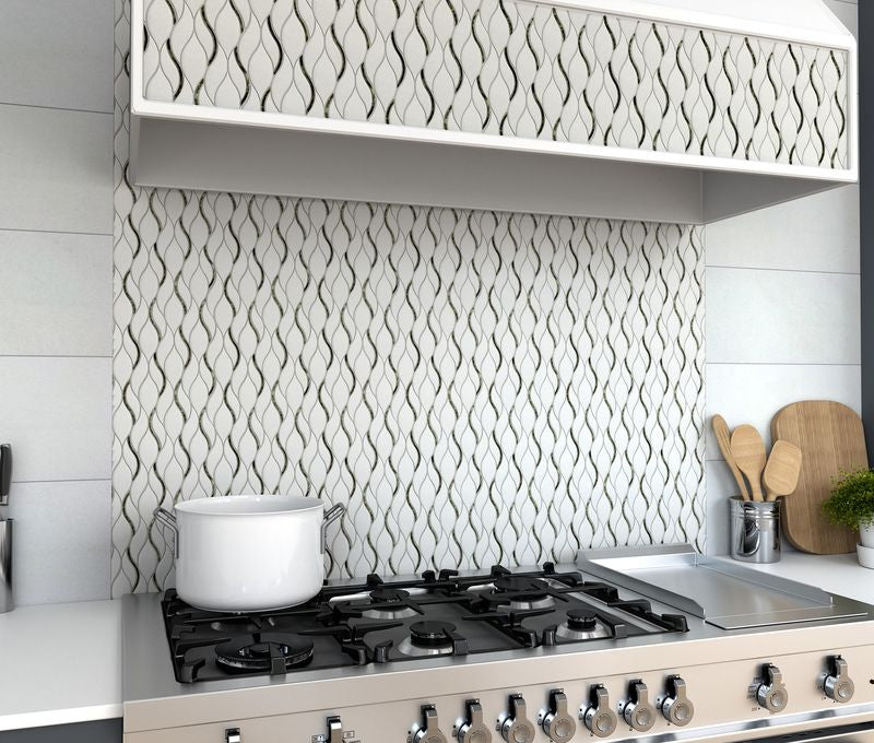 A polished silver and Thassos glass blend gives Dazzle Silver Symmetry mosaic a sleek, contemporary elegance.