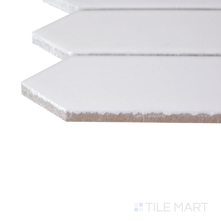 Corner shot of the beige and tan ceramic tile from the Boutique Sleek series, highlighting its material composition and slim profile.