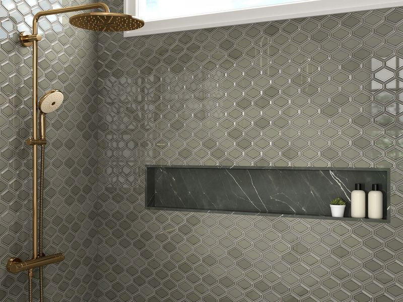 The dark gray and black tile from the Boutique Sleek series adds sophistication and depth to this contemporary space.