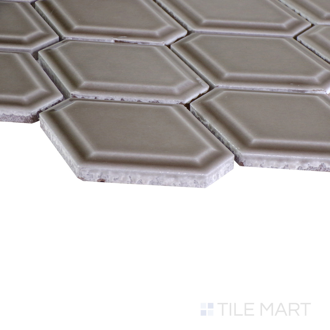 A dynamic angle capturing the dark gray and black tile from the Boutique Sleek series, showcasing its polished surface and modern appeal.