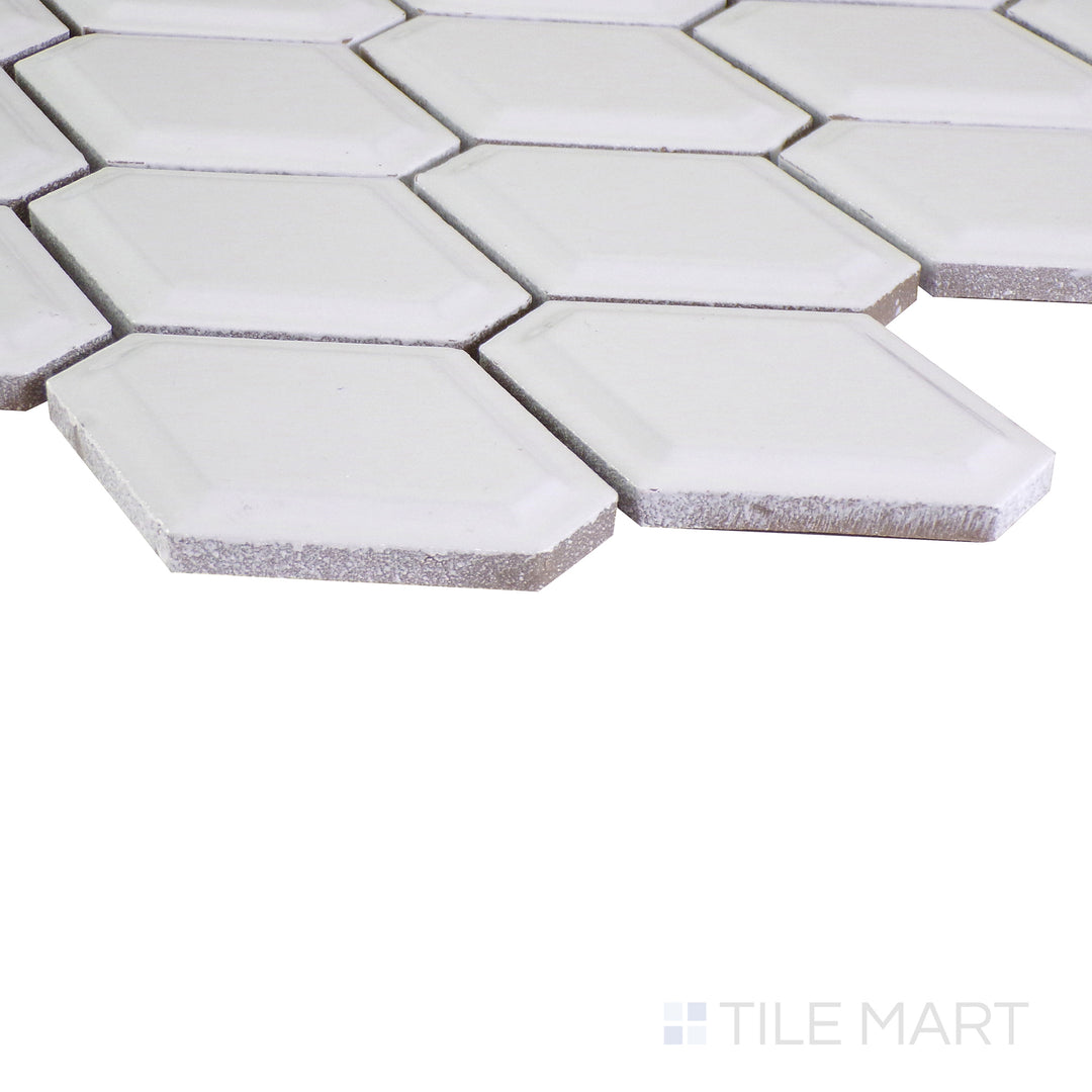 An angled perspective of the glossy white tile from the Salt Glossy series, reflecting light to enhance its sleek appearance.