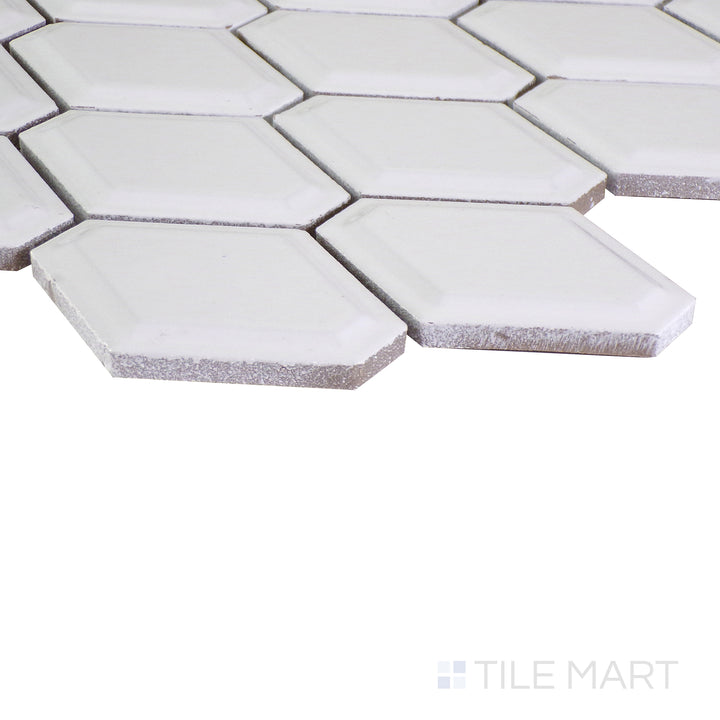 An angled perspective of the glossy white tile from the Salt Glossy series, reflecting light to enhance its sleek appearance.