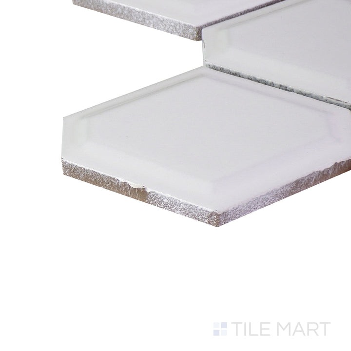 Close-up corner shot of the glossy white tile, showing its ceramic build and sleek edges.